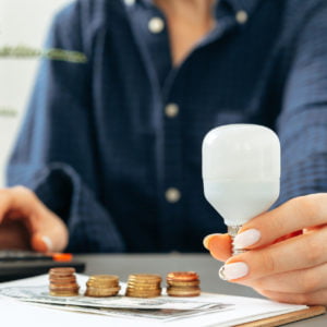 a person holding a glass of milk