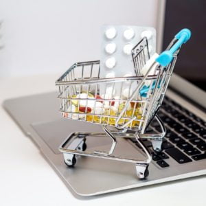 a shopping cart full of pills